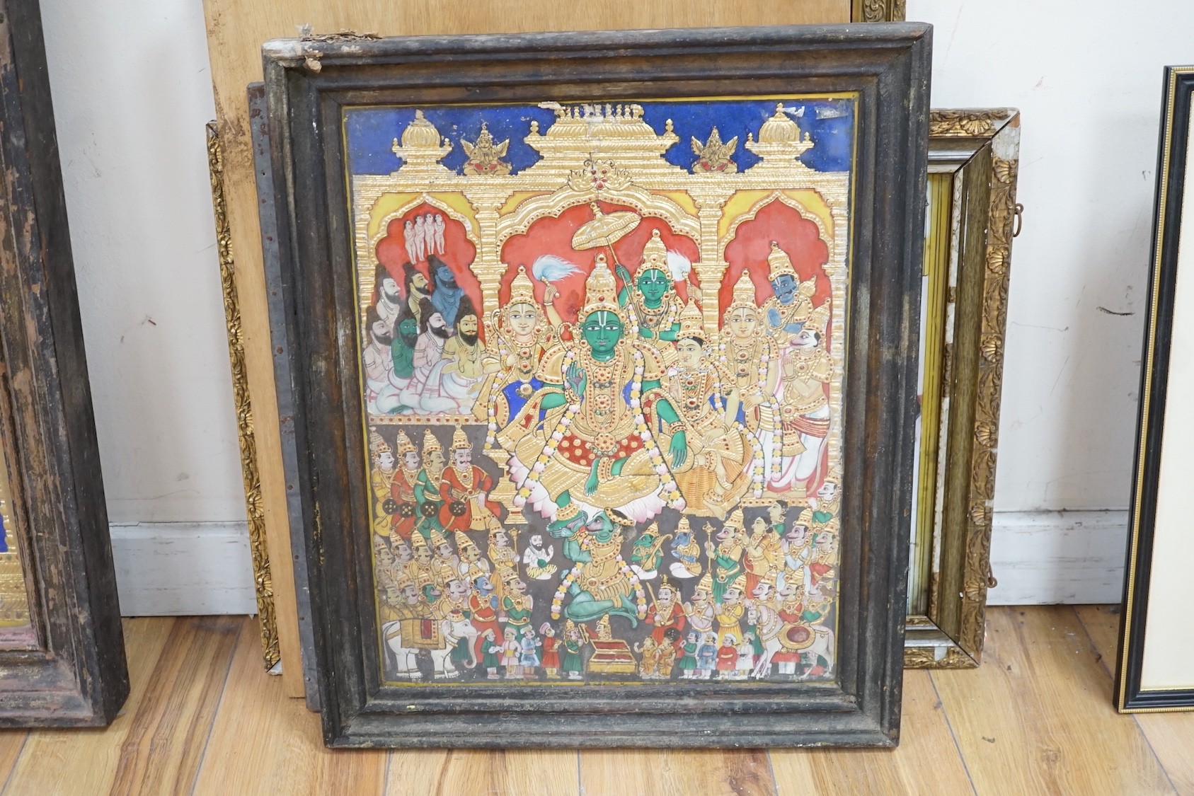 Indian School, eight assorted reverse paintings on glass, Studies of nobles, deities and other figures, largest 60 x 44cm